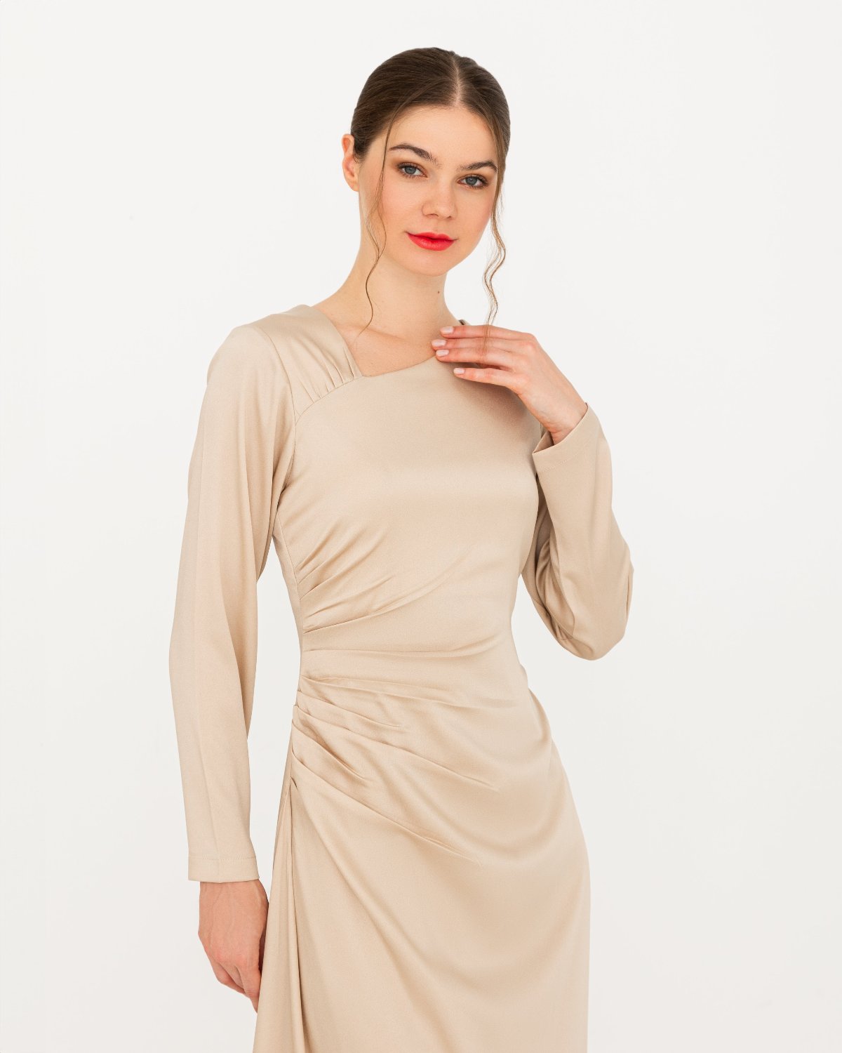 Elevate your style with the SERENA Dress, crafted from luxurious satin with side pleats and an asymmetric neckline. Perfect for a timeless, sophisticated look.